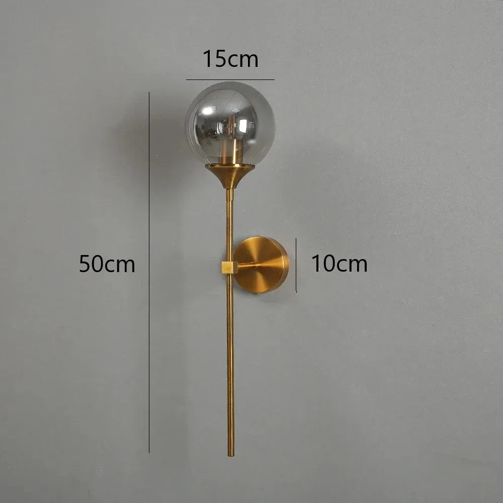 Applique murale design à led avec bras doré et boule en verre - Supra